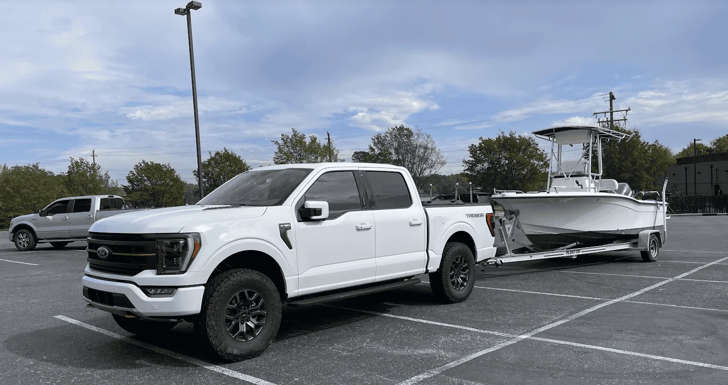The Ford F-150 is built to handle towing for boats and trailers Ford F-150 towing boat near Dana Point Harbor